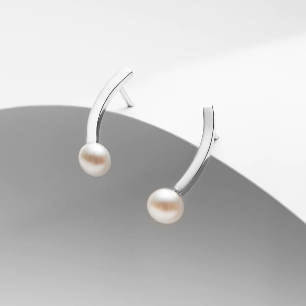 Sirius, freshwater pearl curved bar stud earrings