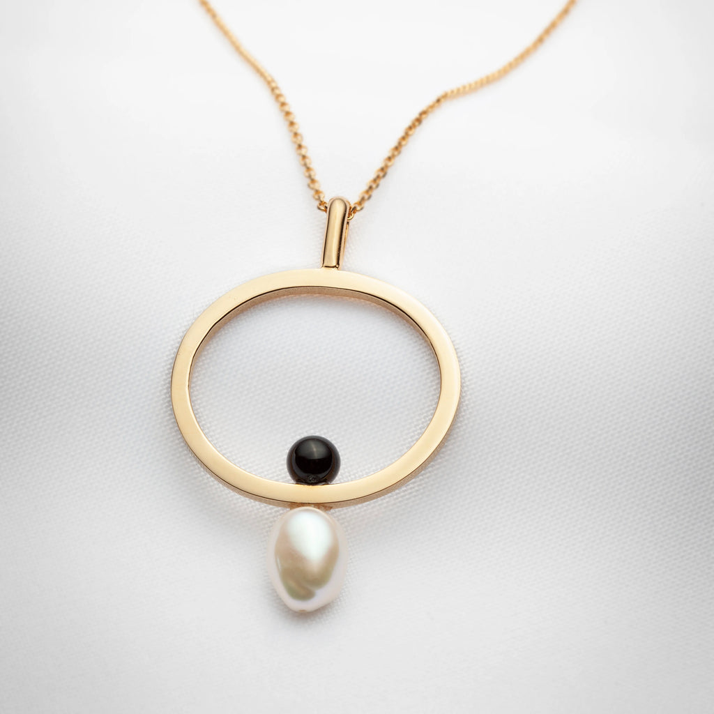 Thalassa, oversized geometric pendant on long chain